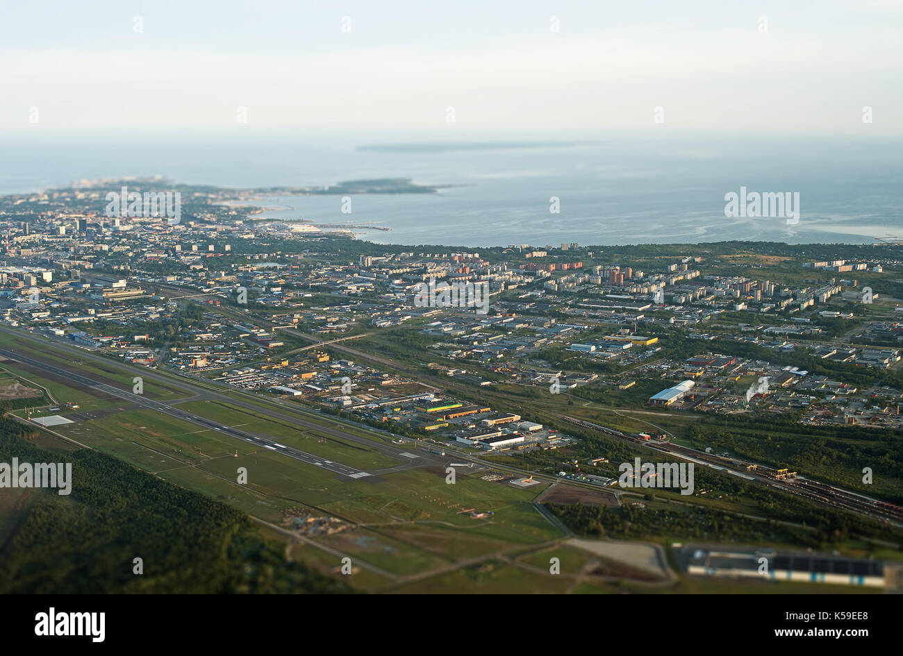 View from the plane to Tallinn airport and Lasnamae district. Stock Photo