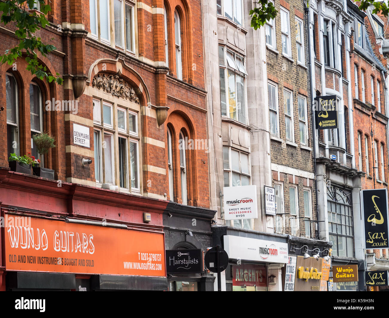 Denmark Street Soho London - part view of London's famous Denmark Street, home to numerous Musical Instrument and Music shops Stock Photo