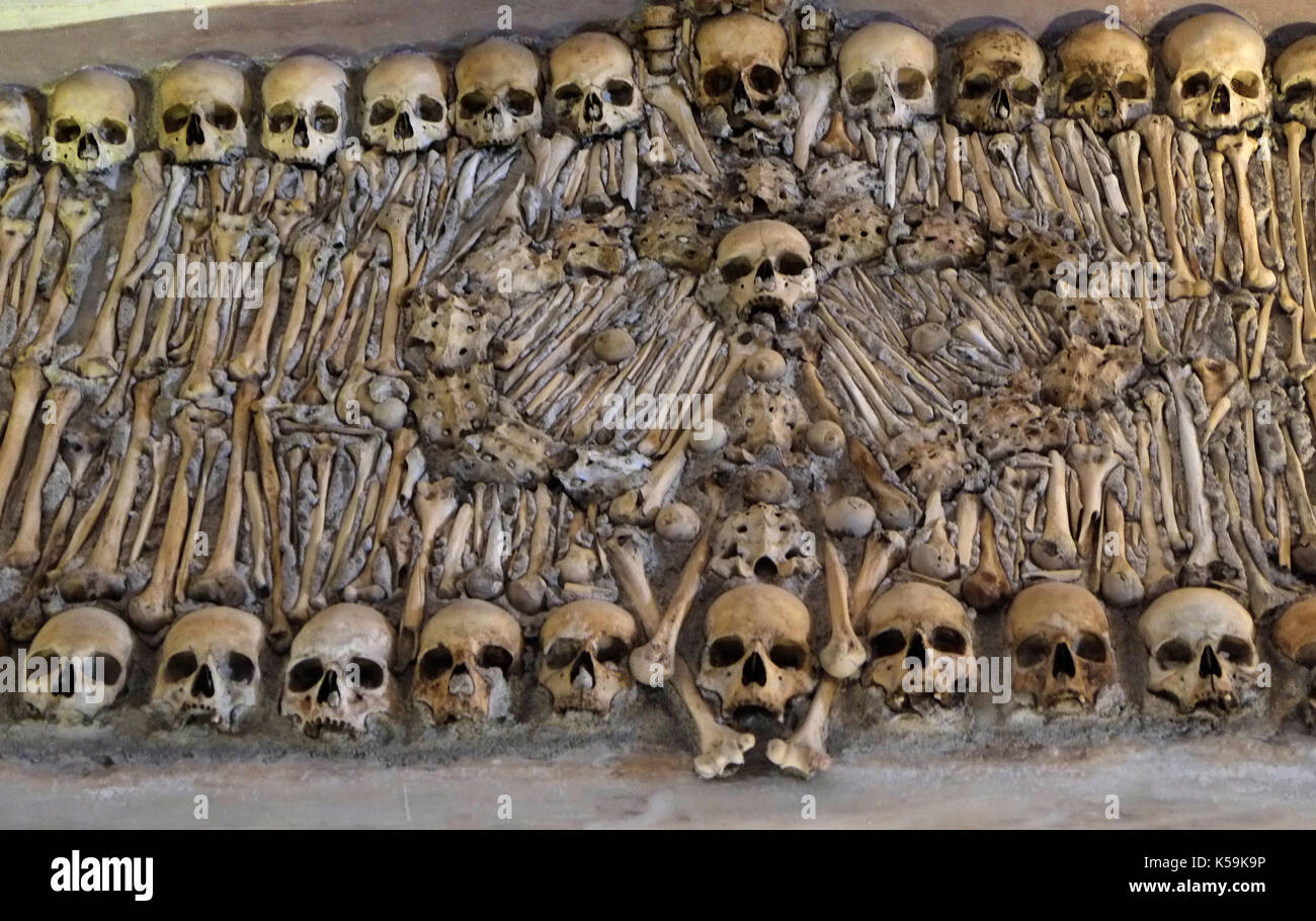 Human skulls and bones cover interior walls in the Chapel of Bones, next to the  Church of St. Francis, Evora, Portugal August 30, 2017. © John Voos Stock Photo
