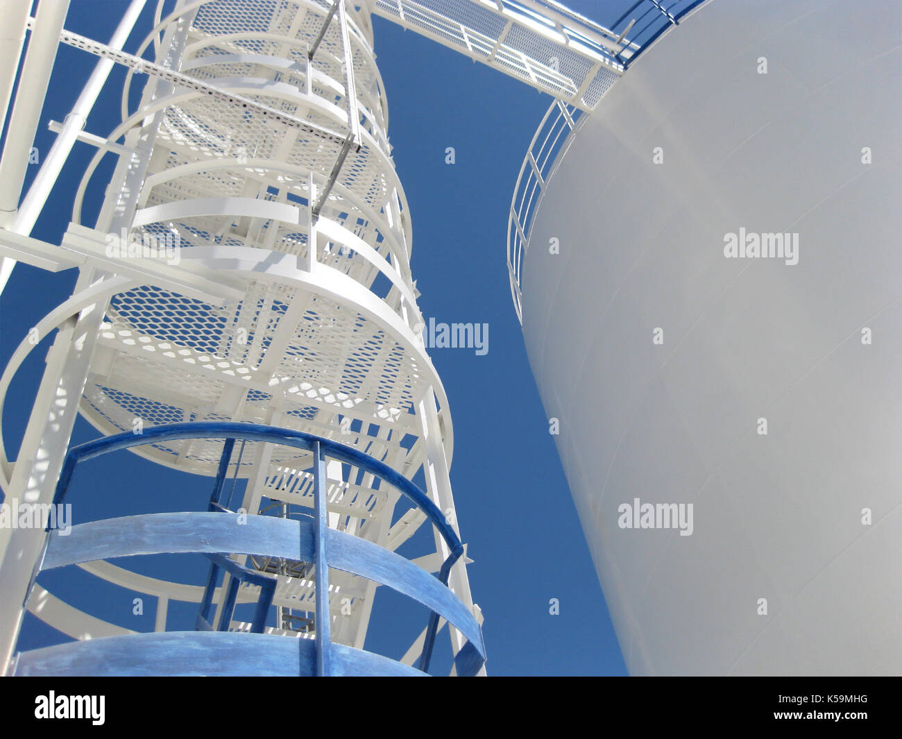 The tank with water and a ladder. Equipment for primary oil refining ...