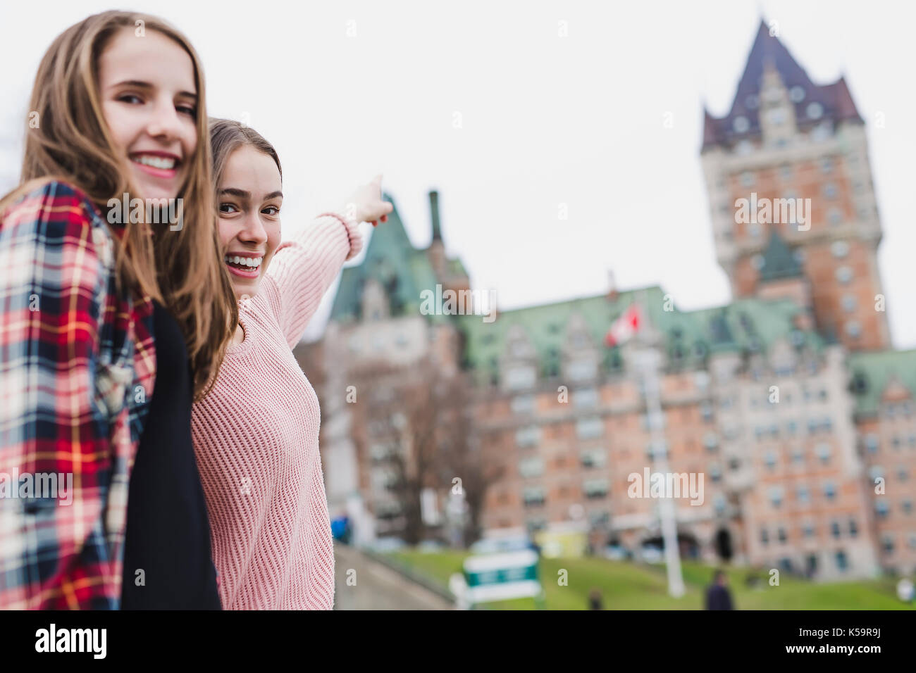 Quebec City scape with Chateau Frontenac and young friend teens ...