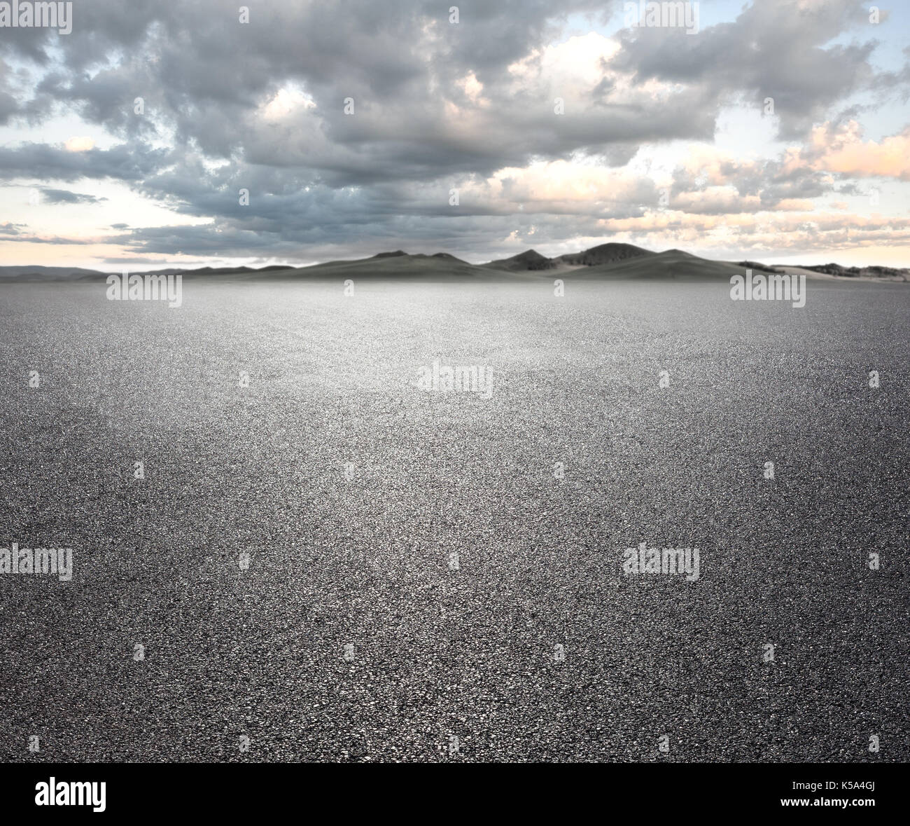 Asphalt road with cloudy sky and mountain background Stock Photo - Alamy