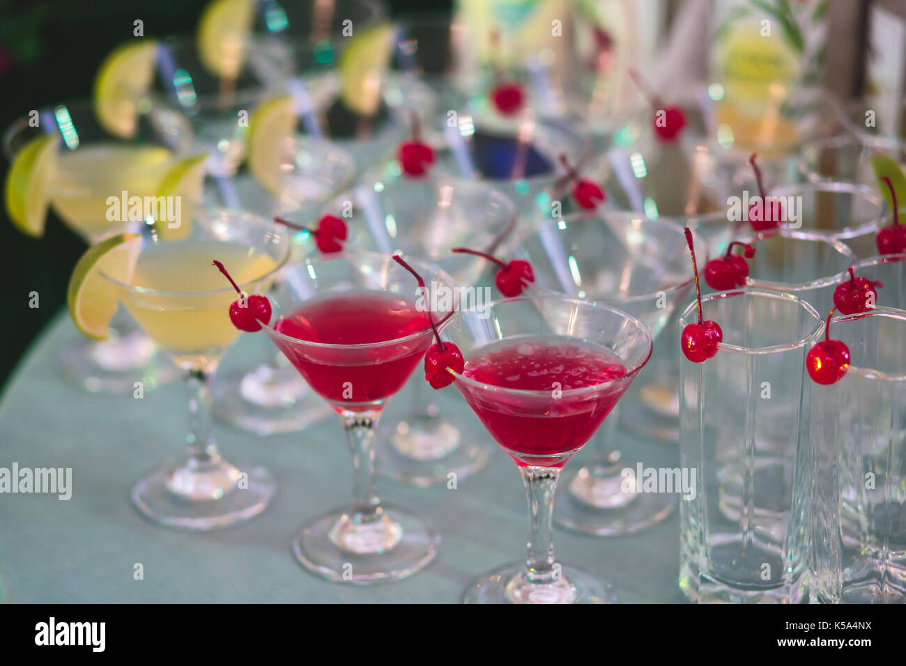 Cocktail Ranges Colour Beautiful line of different coloured cocktails on a open air party ...