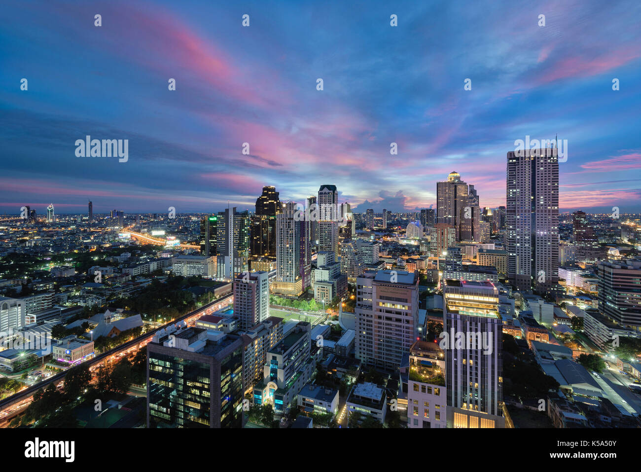 Bangkok city center skyline and colorful sunset sky Stock Photo