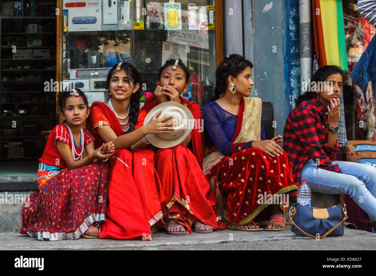 POKHARA, NEPAL - 11/9/2015: Girls in traditional clothes during the Tihar festival in Pokhara, Nepal. Stock Photo