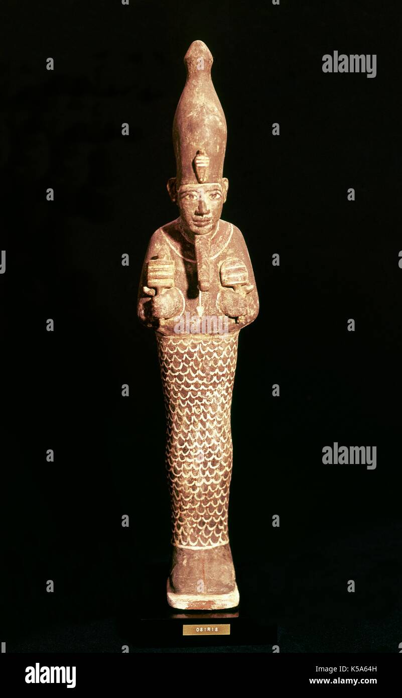 Osiris. Polychrome sculpture. Egyptian art. Stock Photo