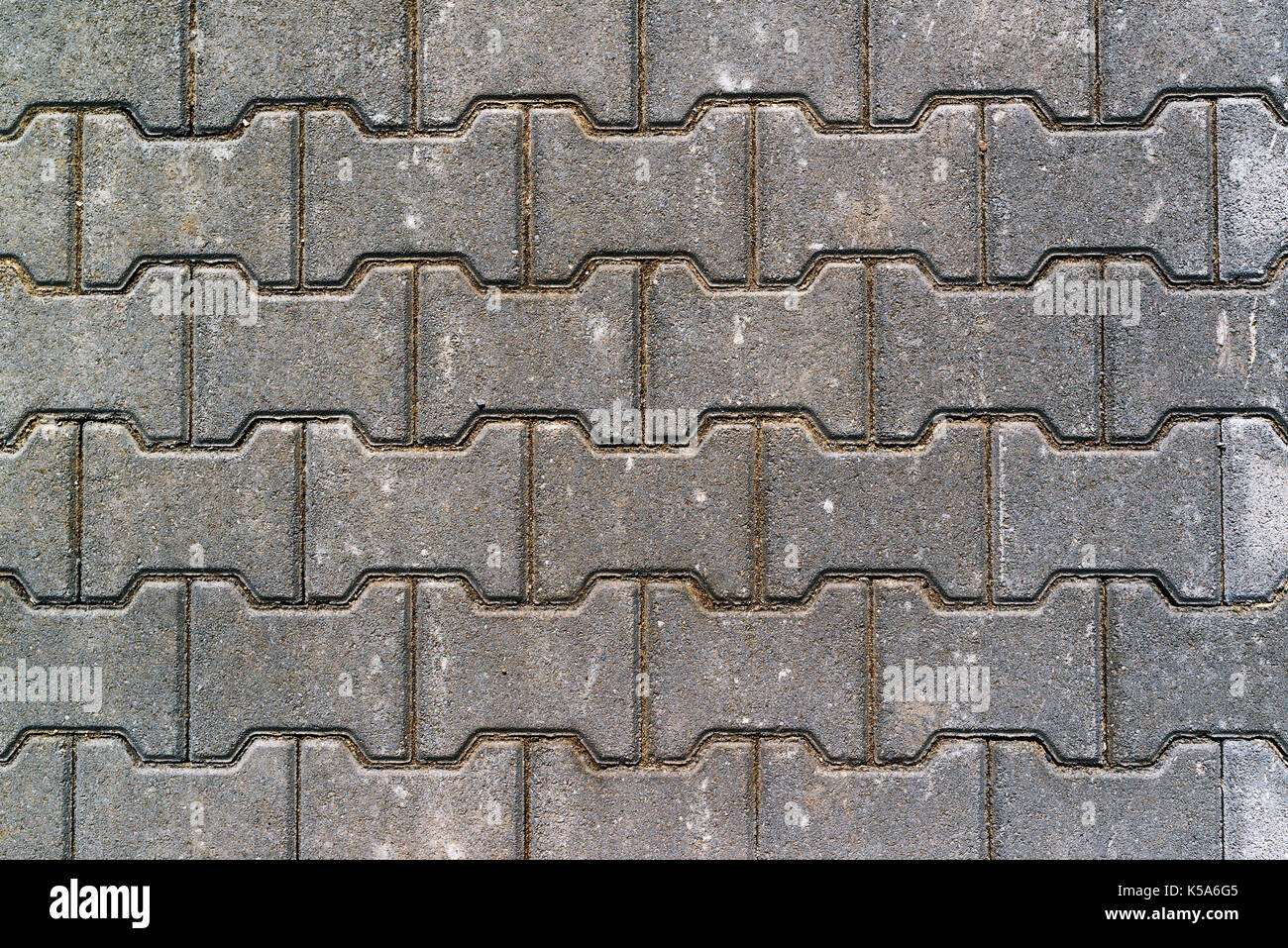 Pavement concrete H shaped slabs texture top view, urban patterns and backgrounds Stock Photo