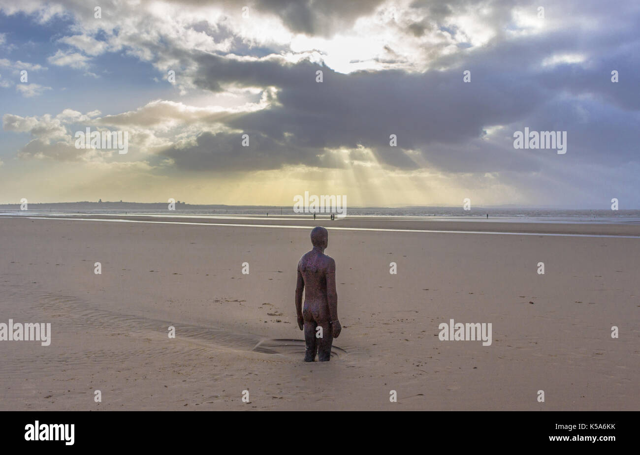 Anthony Gormley statues at crosby beach,Liverpool Stock Photo Alamy
