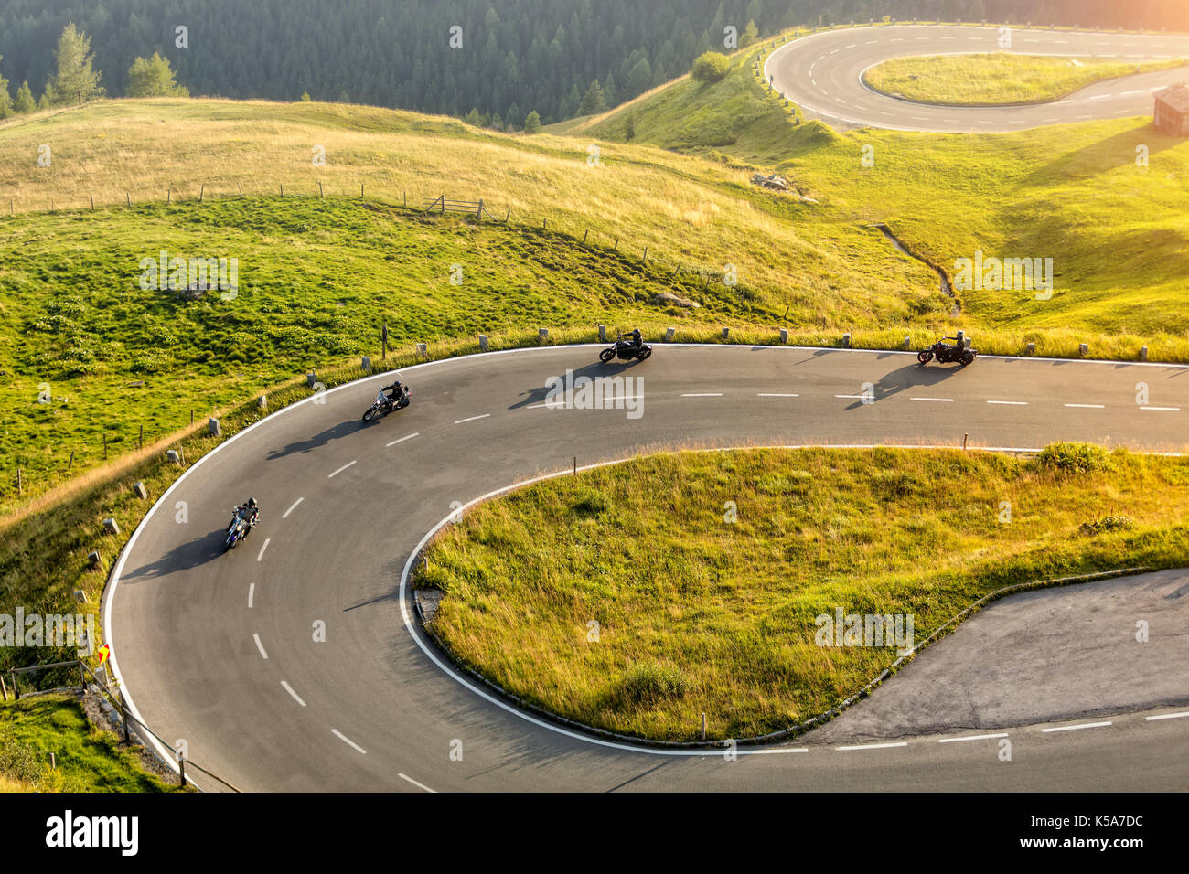 Motorcycle drivers riding in Alpine highway, Hochalpenstrasse, Austria ...