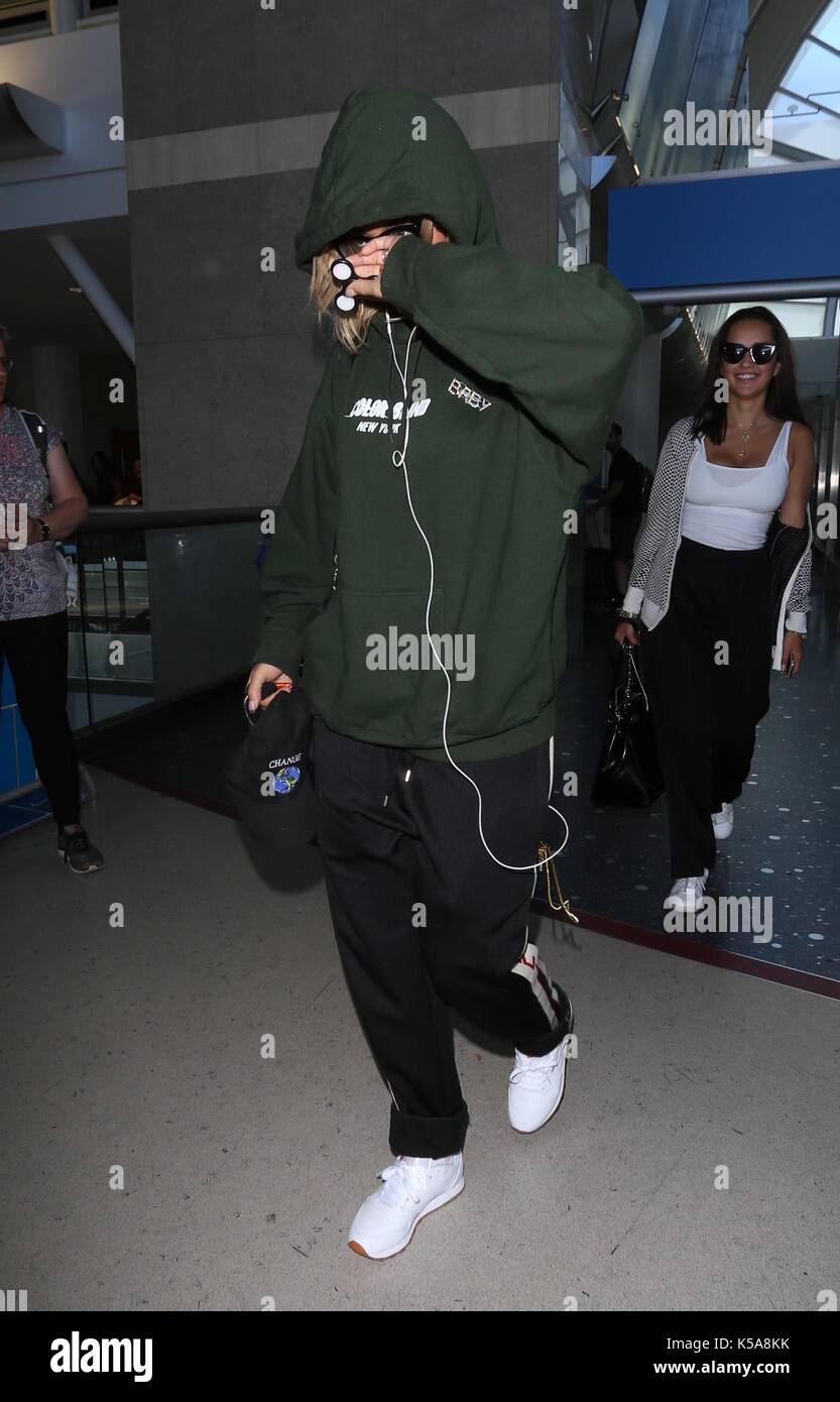 Rita Ora arrives at Los Angeles International Airport wearing baggy hoodie  and joggers outfit, Stock Photo, Picture And Rights Managed Image. Pic.  WEN-WENN32097069