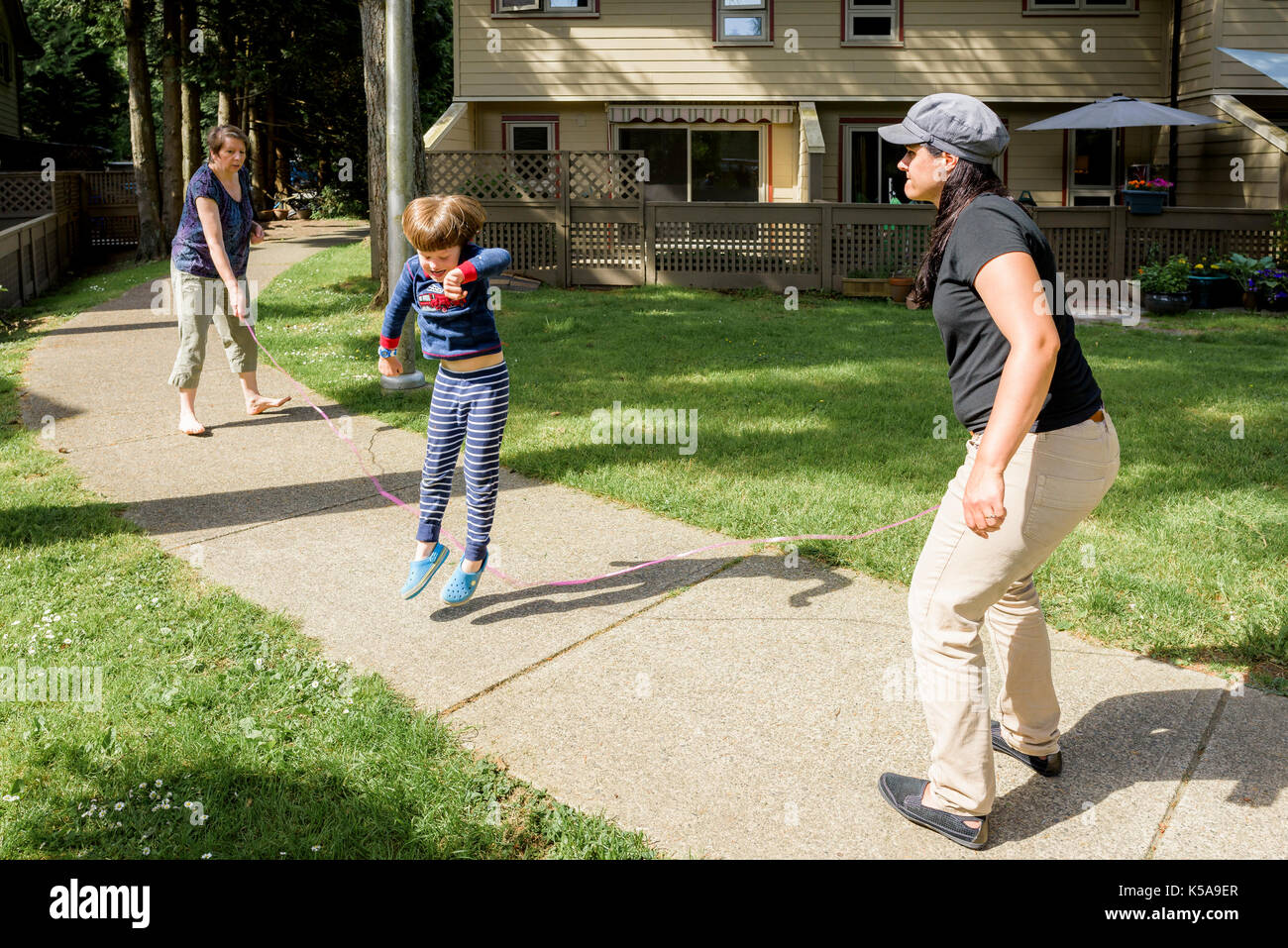 Boy skipping rope hires stock photography and images Alamy