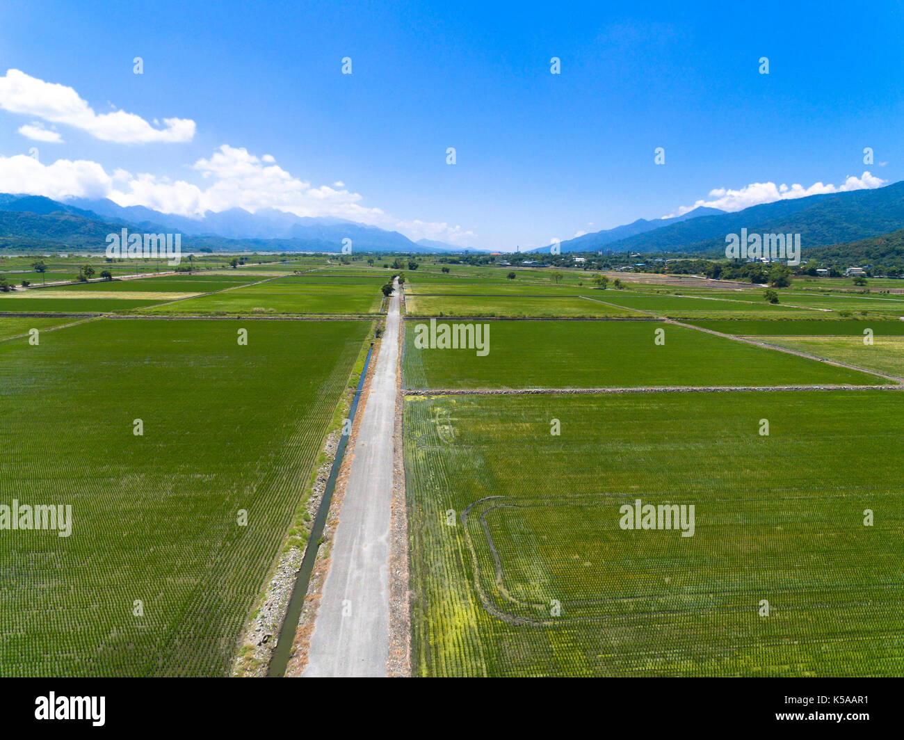 Aerial view of the countryside with village and rice farms Stock Photo ...