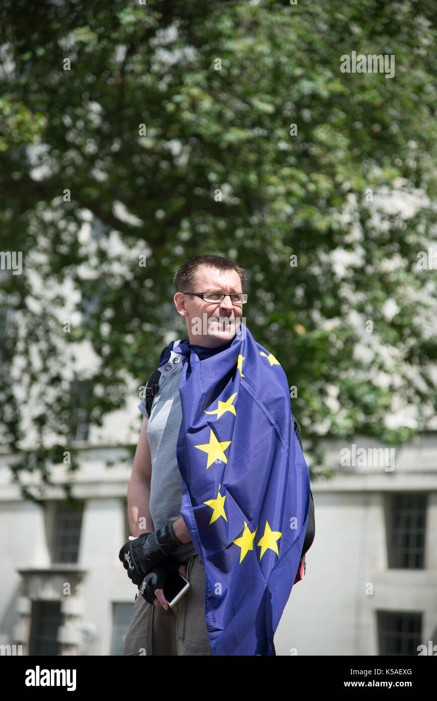 London, UK. 2nd July 2016. March for Europe - Man wrapped in EU flag. Credit: A.Bennett Stock Photo
