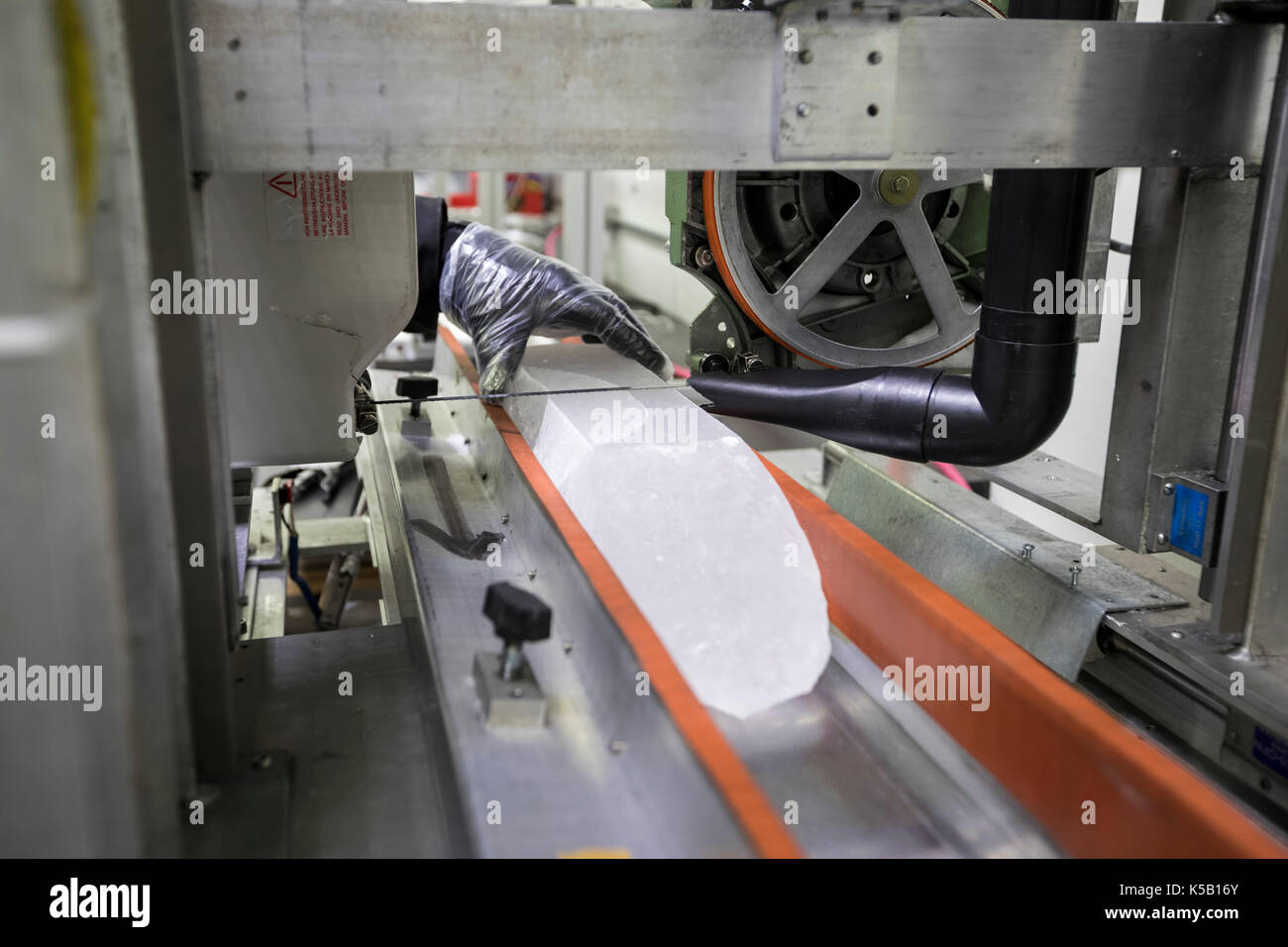 Denver, Colorado - An ice core from Greenland is prepared for cutting at the National Ice Core Laboratory. The lab stores 19,000 meters of ice cores f Stock Photo