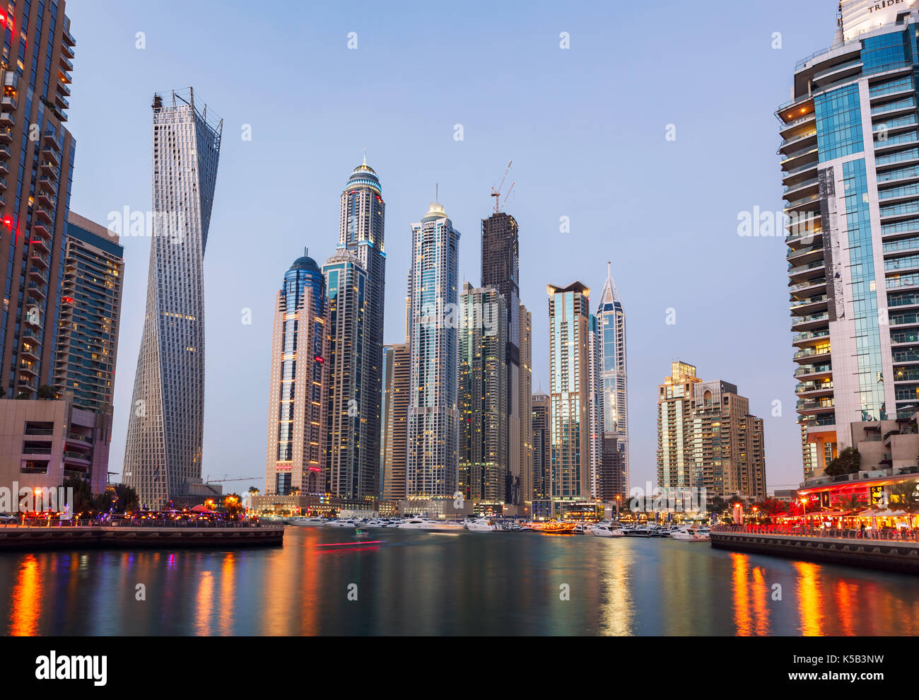 Panoramic view with modern skyscrapers and water pier of Dubai Marina , United Arab Emirates Stock Photo