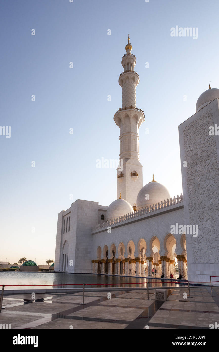 Minaret,dome and courtyard of white  Grand Mosque called as Sheikh Zayed Mosque,UAE Stock Photo