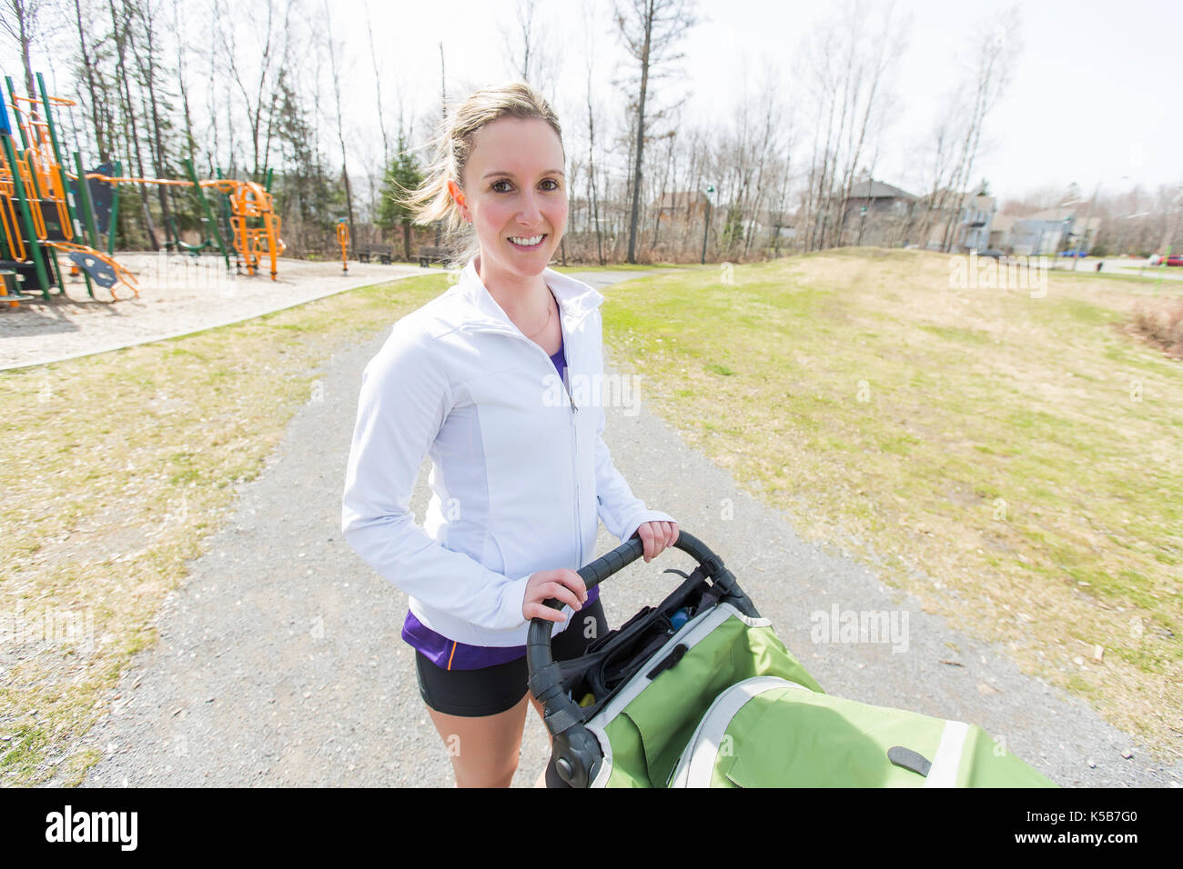 Mother doing Training, jogging with baby Stock Photo Alamy
