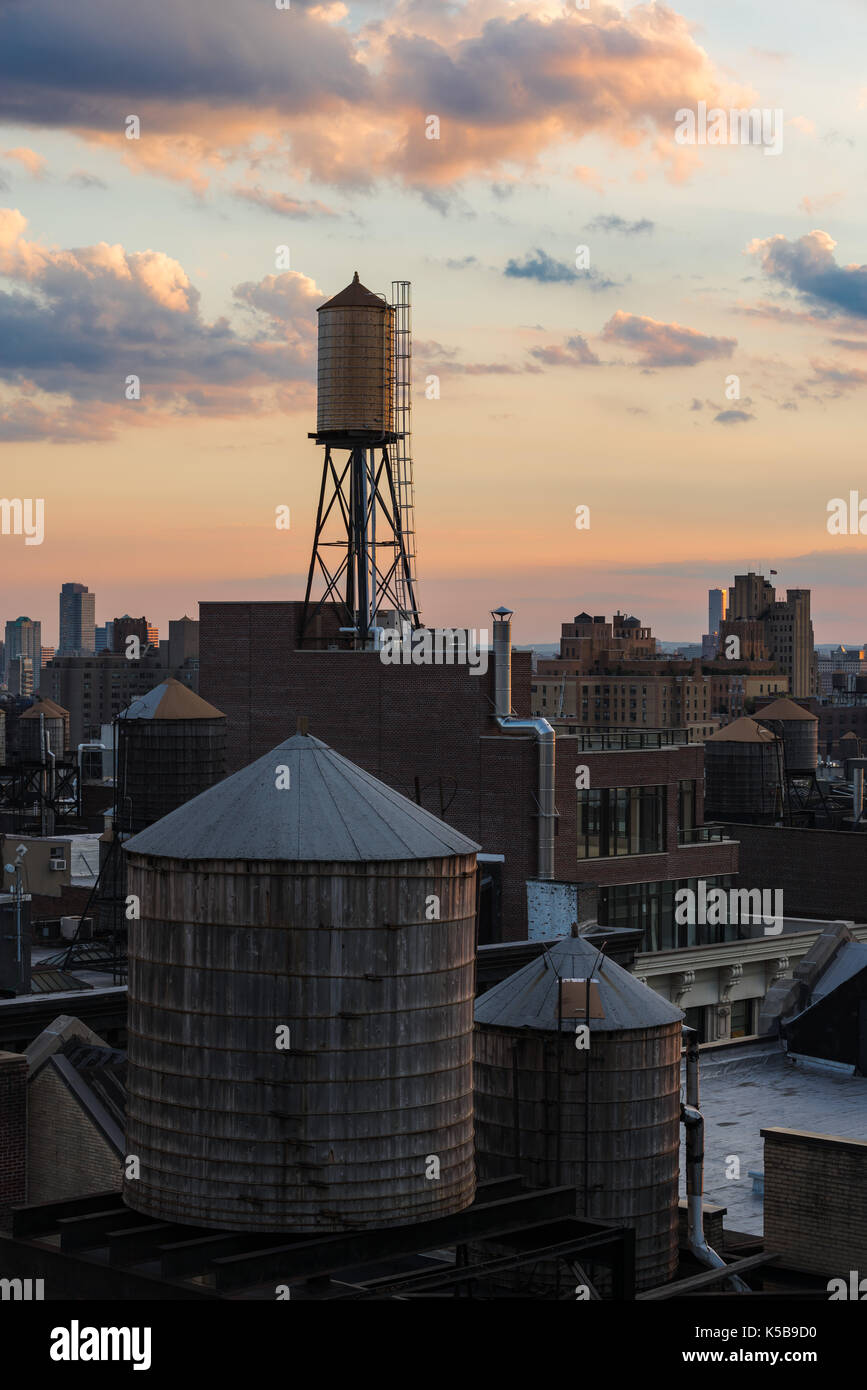 Summer sunset with Chelsea rooftops, and water towers. Manhattan, New