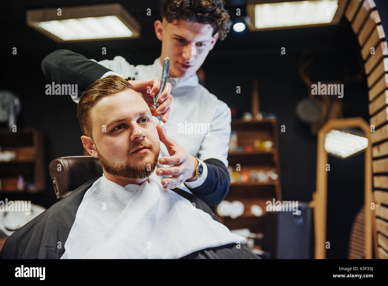 Man Hairdresser Doing Haircut Beard Adult Men In The Men S Hair
