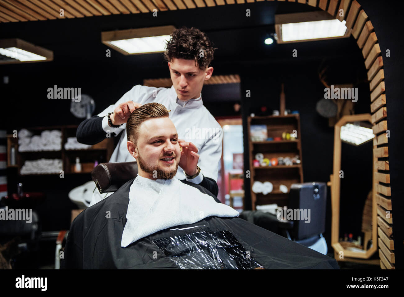 Man Hairdresser Doing Haircut Beard Adult Men In The Men S Hair