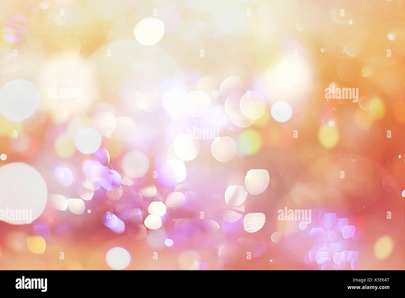 Festive background with natural bokeh and bright golden lights. Vintage ...