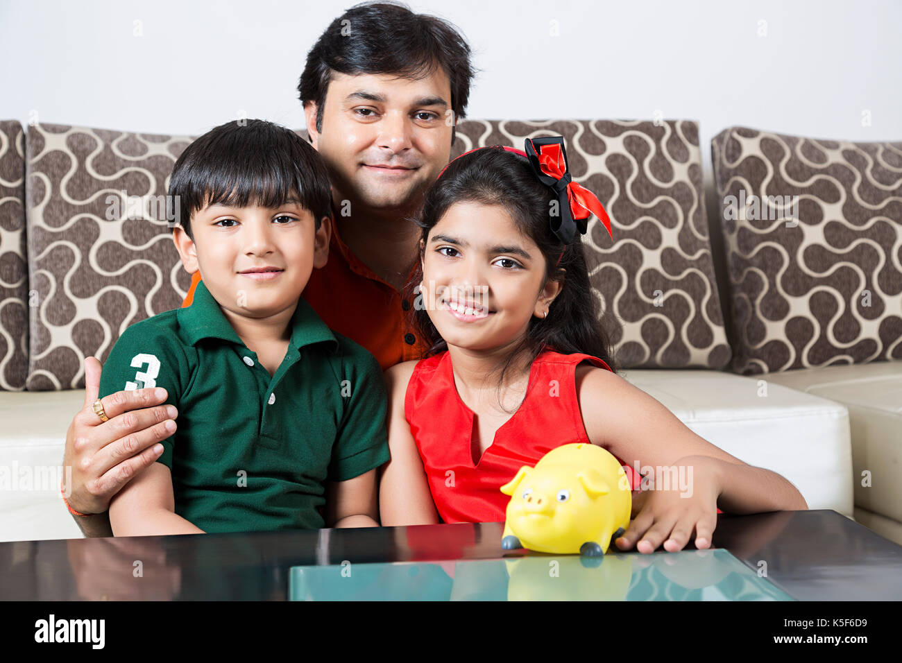 Father And Kids Saving Money Piggy bank Future Education Stock Photo ...