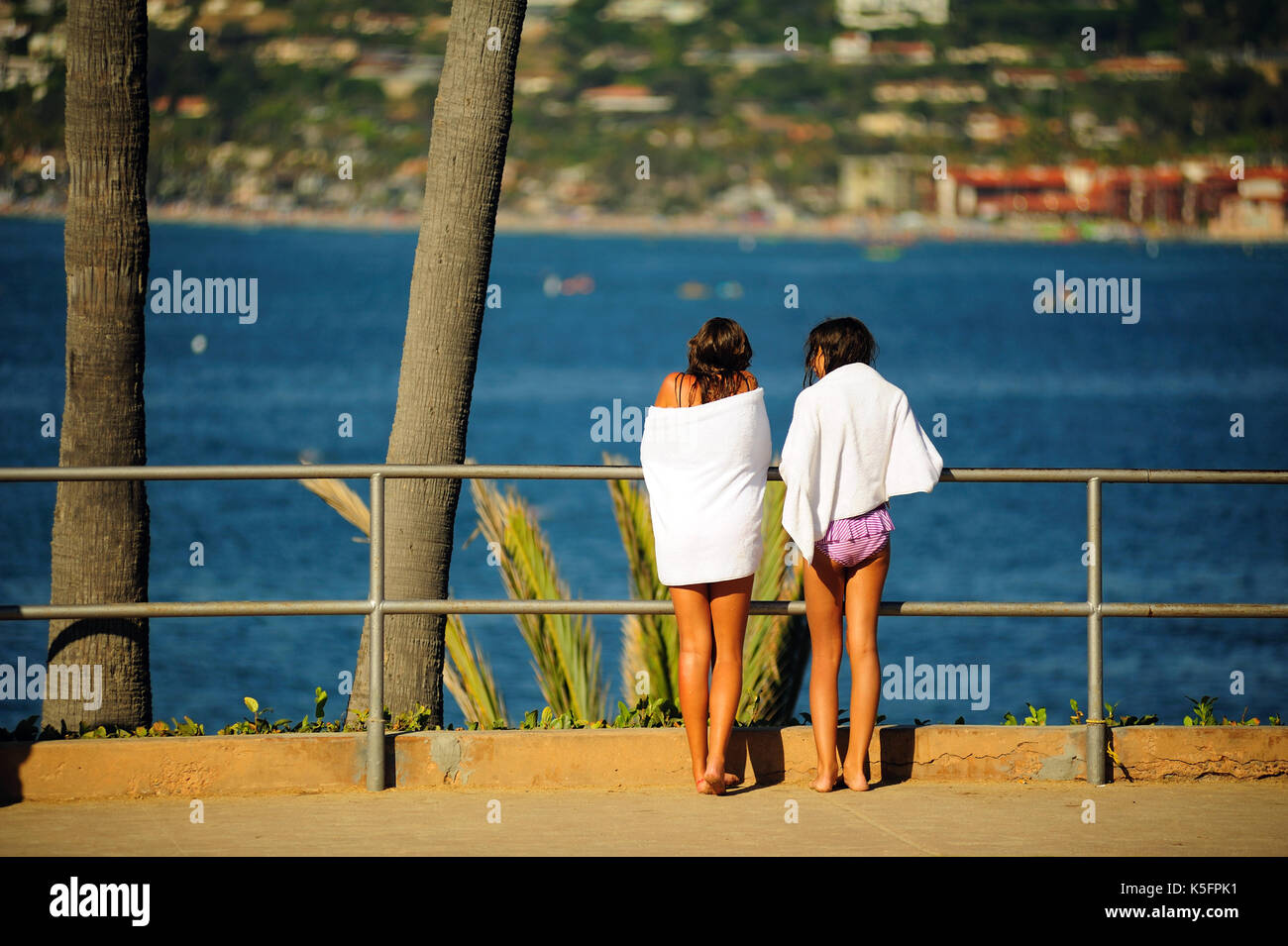 San Diego,United States - on: July 30th, 2013:Two girls in the sun at La Jolla Cove in San Diego during a sunny summer day. Stock Photo