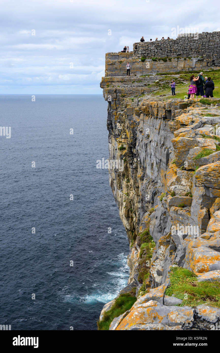 Dramatic sheer cliffs at Dun Aonghasa, a prehistoric stone fort, on Inishmore Island in the Aran Group, County Galway, Republic of Ireland Stock Photo