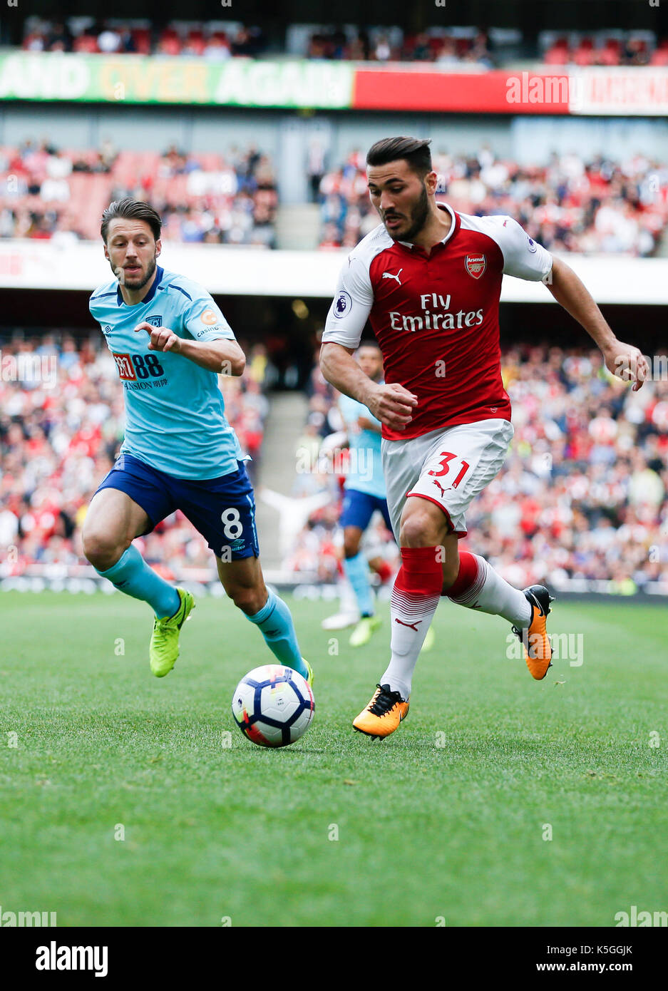 London, UK. 9th Sep, 2017. Sead Kolasinac (R) of Arsenal breaks through during the English Premier League match between Arsenal and Bournemouth at the Emirates Stadium in London, Britain on Sept. 9, 2017. Credit: Han Yan/Xinhua/Alamy Live News Stock Photo