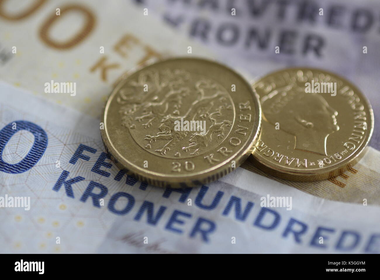 Henne Strand, Denmark. 26th Aug, 2017. Danish kroner on a table in Henne  Strand, Denmark, 26 August 2017. Denmark rejected joining the Eurozone in a  referendum in 2000. The krone is, however,