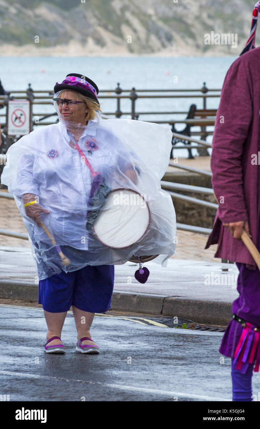 Swanage, Dorset, UK. 9th Sep, 2017. Crowds flock to the Swanage Folk Festival on the 25th anniversary to see the dance groups and music along the seafront. The mixed weather, sunshine and rain, doesn't deter their spirits. Credit: Carolyn Jenkins/Alamy Live News Stock Photo