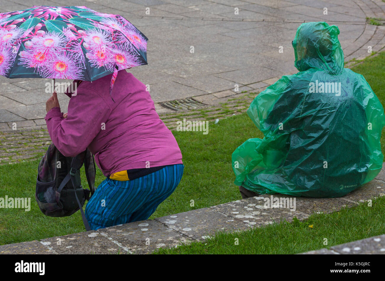 Umbrella rain man back wall hires stock photography and images Alamy