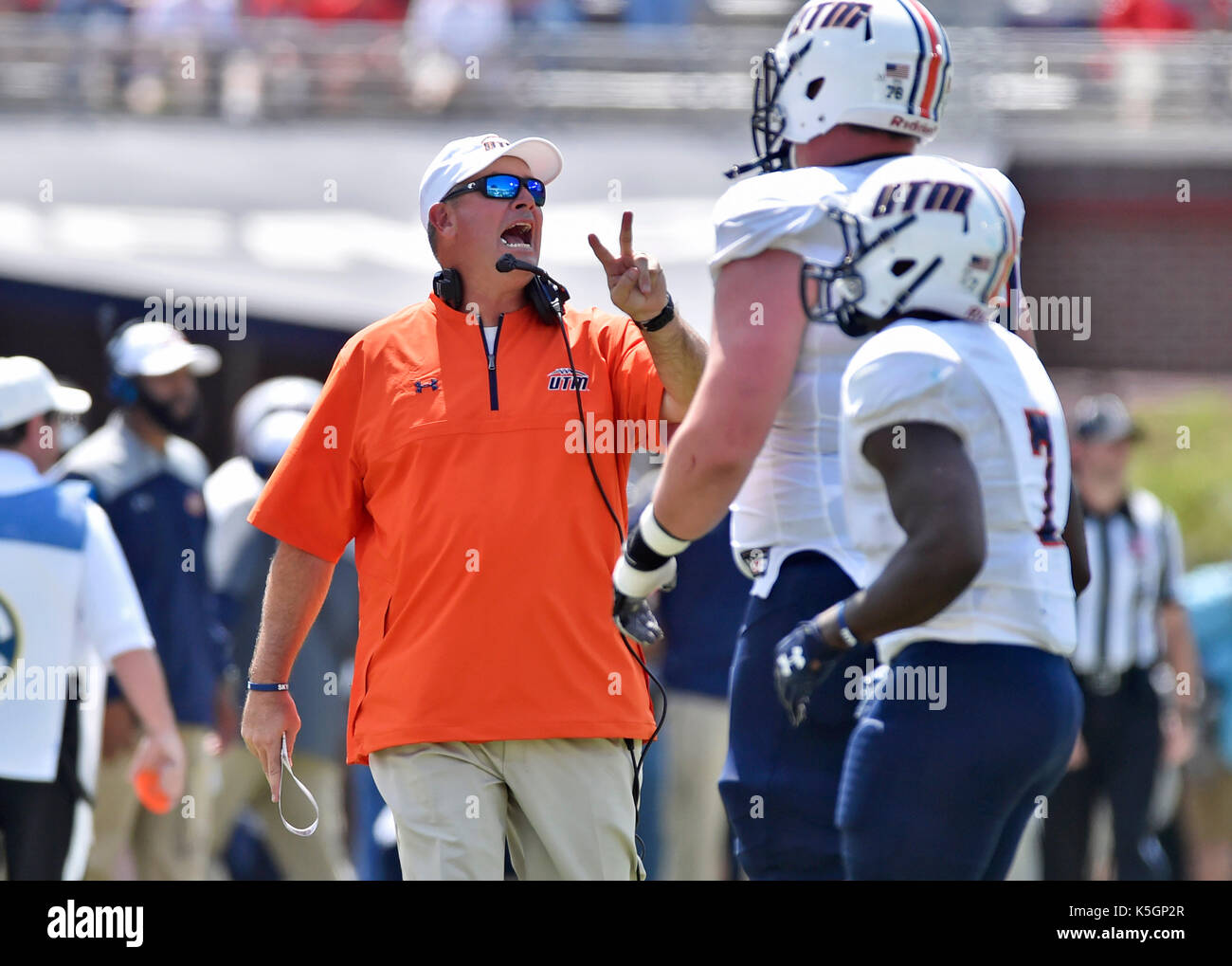 Oxford, MS, USA. 9th Sep, 2017. Tennessee-Martin coach Jason Simpson talks to one of his players during a third quarter timeout of a NCAA college football game against Mississippi at Vaught-Hemmingway Stadium in Oxford, MS. Mississippi won 45-23. Austin McAfee/CSM/Alamy Live News Stock Photo