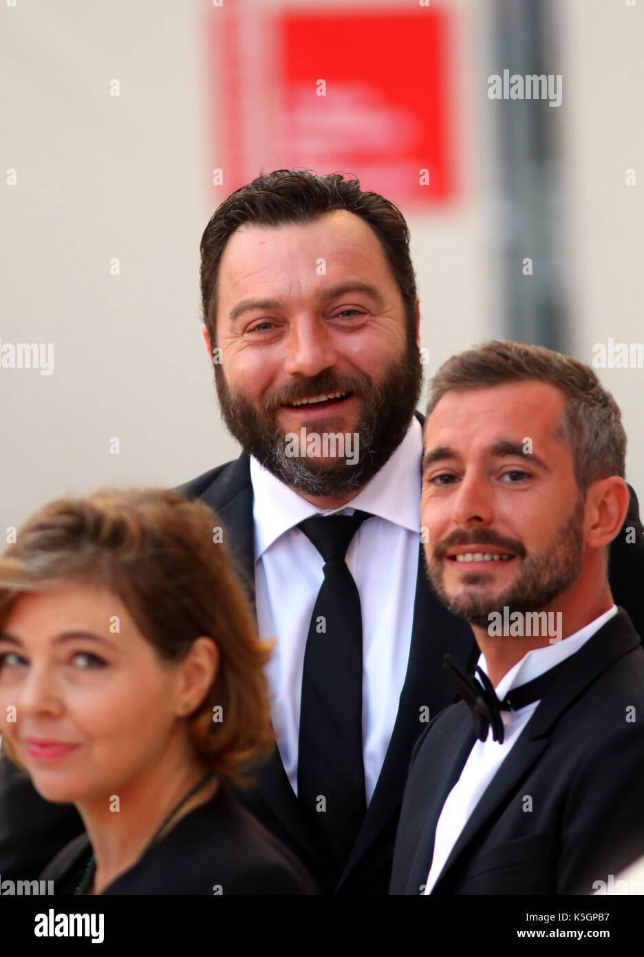 Venice, Italy. 9th September, 2017. Denis Menochet (C) with Xavier Legrand (R) attends at the Award Ceremony during the 74th Venice International Film Festival at Lido of Venice on 9th September, 2017. Credit: Andrea Spinelli/Alamy Live News Stock Photo