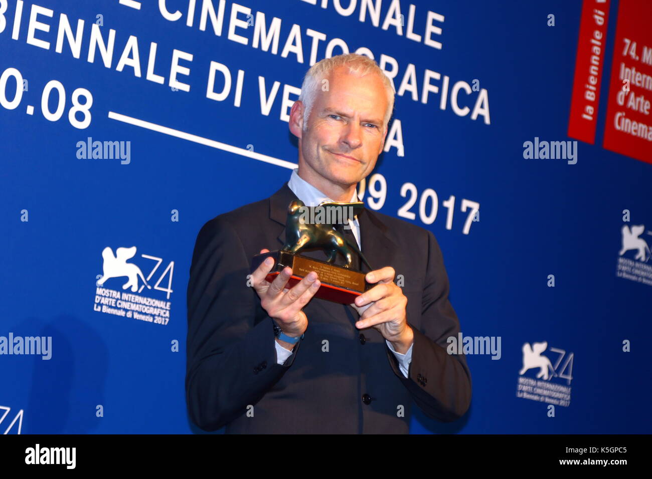 Venice, Italy. 9th September, 2017. Martin McDonagh poses with the Best Screenplay Award for 'Three Billboards Outside Ebbing, Missouri' at the Award Photocall during the 74th Venice International Film Festival at Lido of Venice on 9th September, 2017. Credit: Andrea Spinelli/Alamy Live News Stock Photo