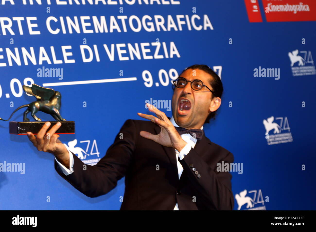 Venice, Italy. 9th September, 2017. Alireza Khatam poses with the Orizzonti Award for Best Screenplay Award for 'Los Versos Del Olvido' at the Award Photocall during the 74th Venice International Film Festival at Lido of Venice on 9th September, 2017. Credit: Andrea Spinelli/Alamy Live News Stock Photo