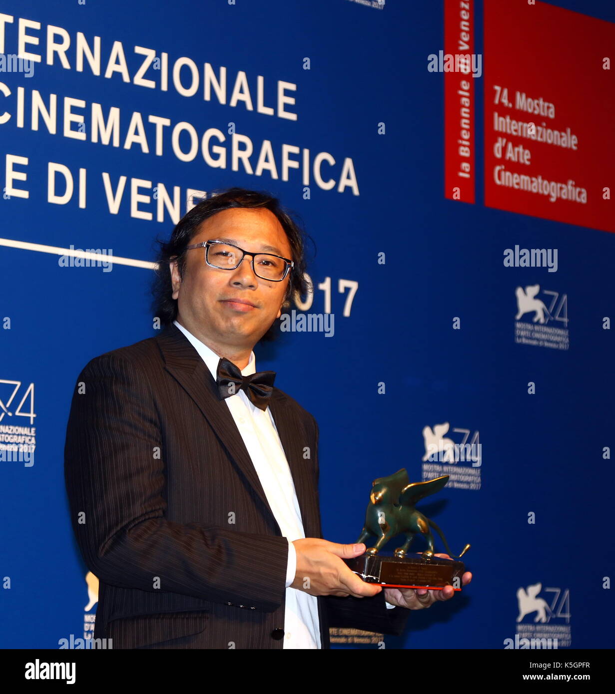 Venice, Italy. 9th September, 2017. Hsin-Chien Huang poses with the Best VR Experience Award for 'La Camera Insabbiata' co-directed with Laurie Anderson at the Award Photocall during the 74th Venice International Film Festival at Lido of Venice on 9th September, 2017. Credit: Andrea Spinelli/Alamy Live News Stock Photo