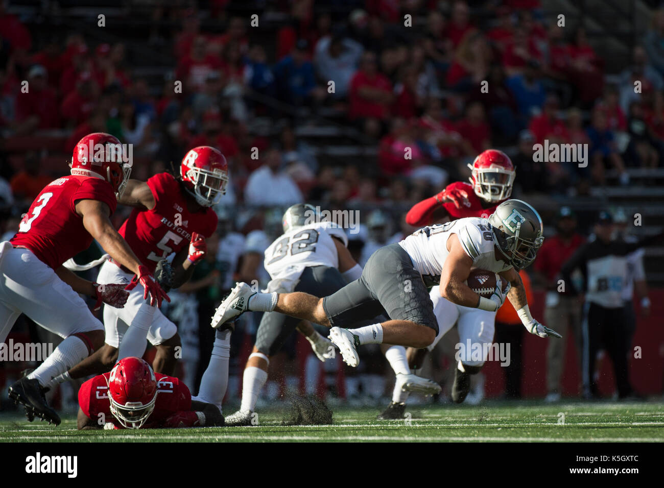 Piscataway, NJ, USA. 09th Sep, 2017. Eastern Michigan Eagles running back Blake Banham (20) leaps through the air during the game between The Eastern Michigan Eagles and The Rutgers Scarlet Knights at Highpoint Solutions Stadium in Piscataway, NJ. Mandatory Credit: Kostas Lymperopoulos/CSM, Credit: csm/Alamy Live News Stock Photo