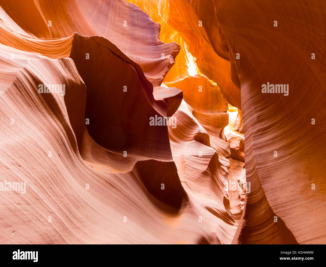 Eroded rock formations inside the Lower Antelope Canyon near Page, Arizona (USA). The sandstone slot canyon is a major tourist attraction. Stock Photo