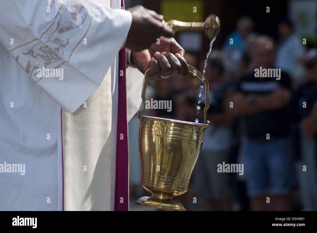 Holy water sprinkler hi-res stock photography and images - Alamy