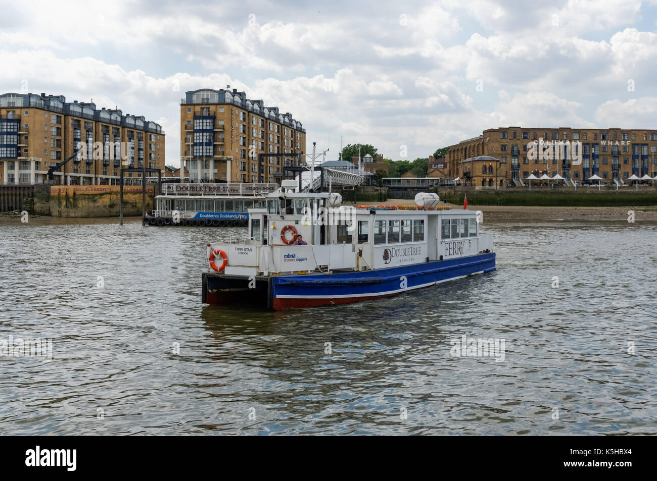 The Canary Wharf - Rotherhithe Ferry on the River Thames in London, England, United Kingdom, UK Stock Photo
