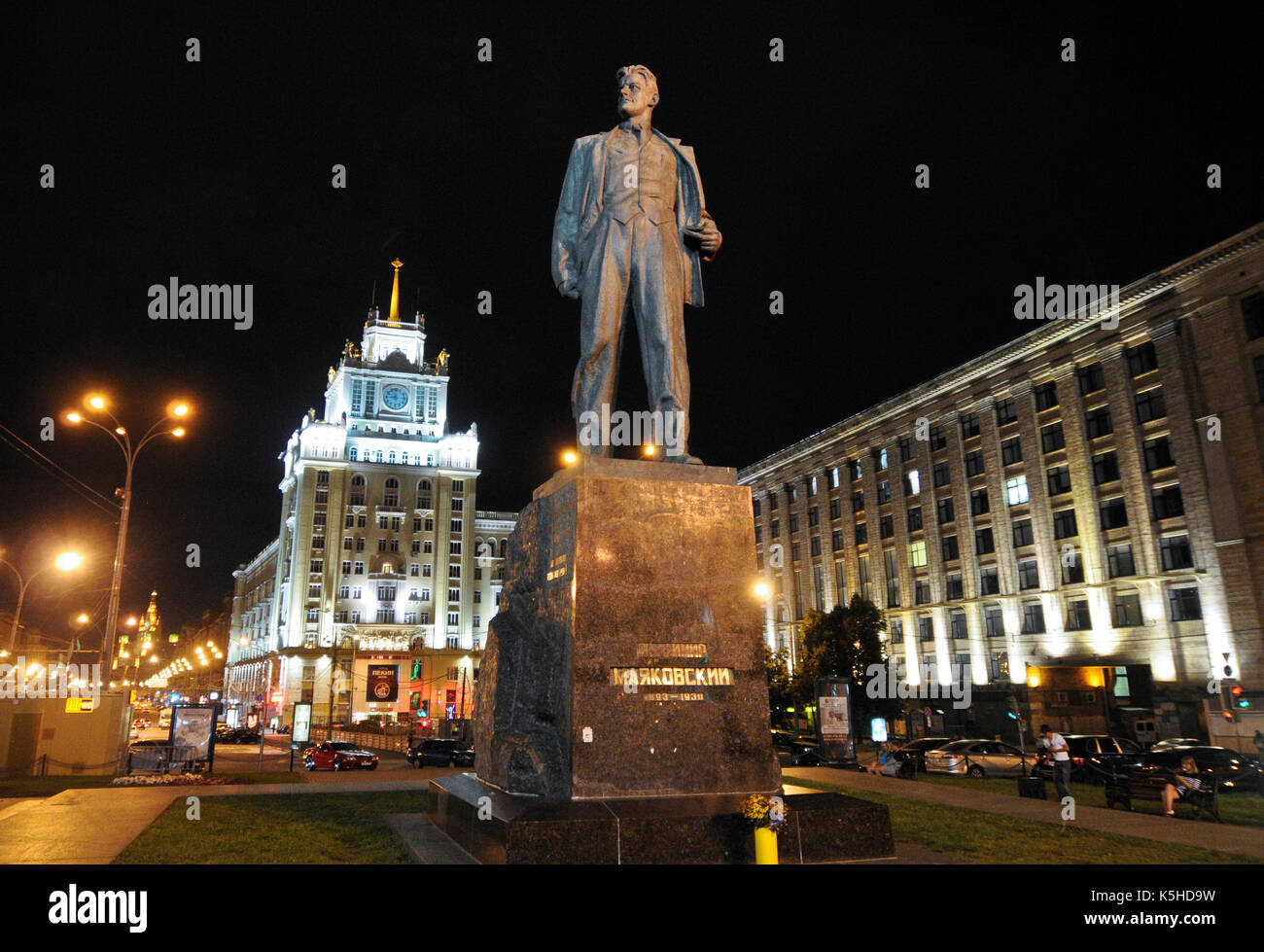 Mayakovsky statue, with Red Gates Administrative Building on the back. Moscow Stock Photo