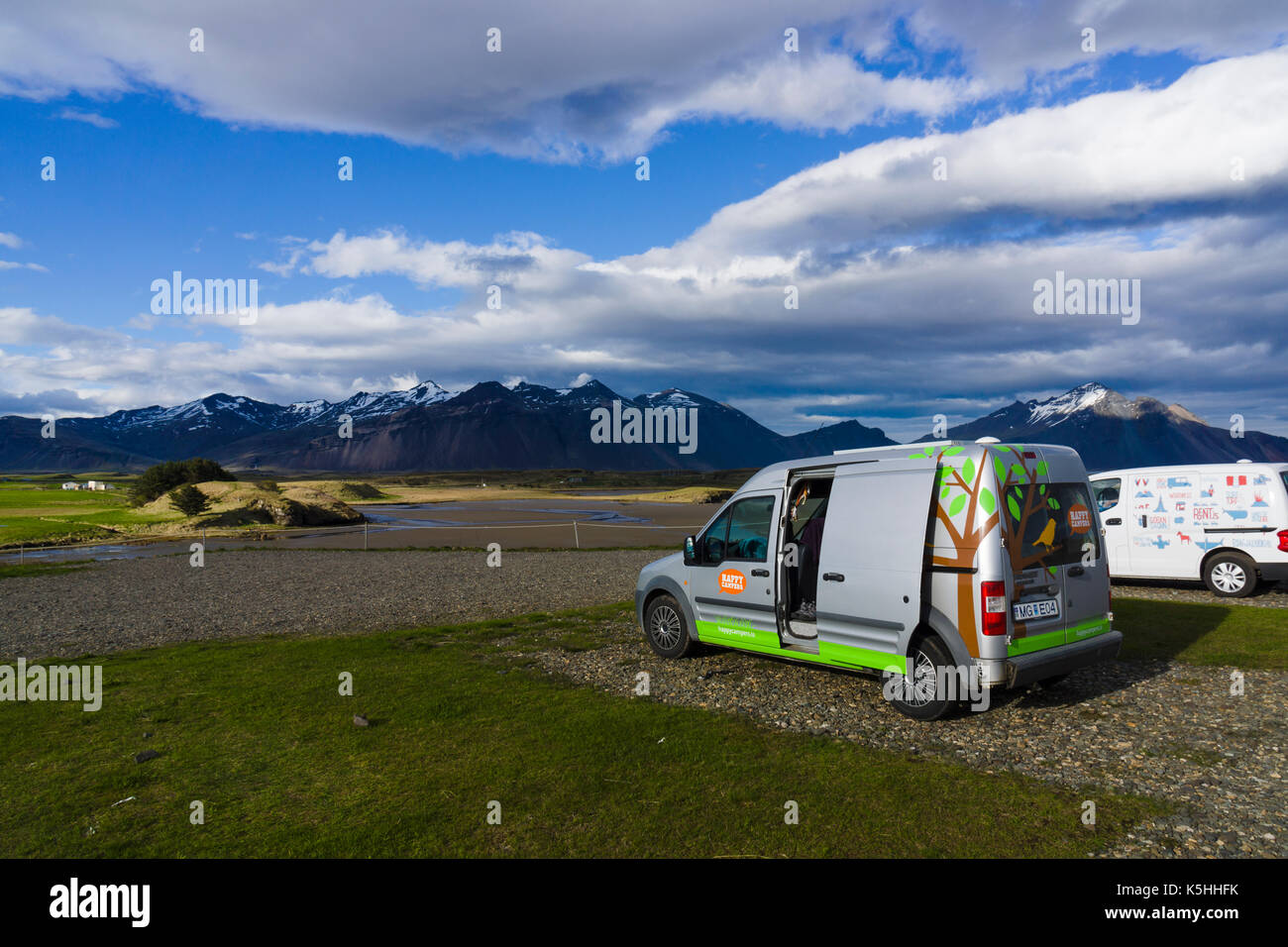 Small campervans at Hfn campground in southeast Iceland Stock Photo - Alamy