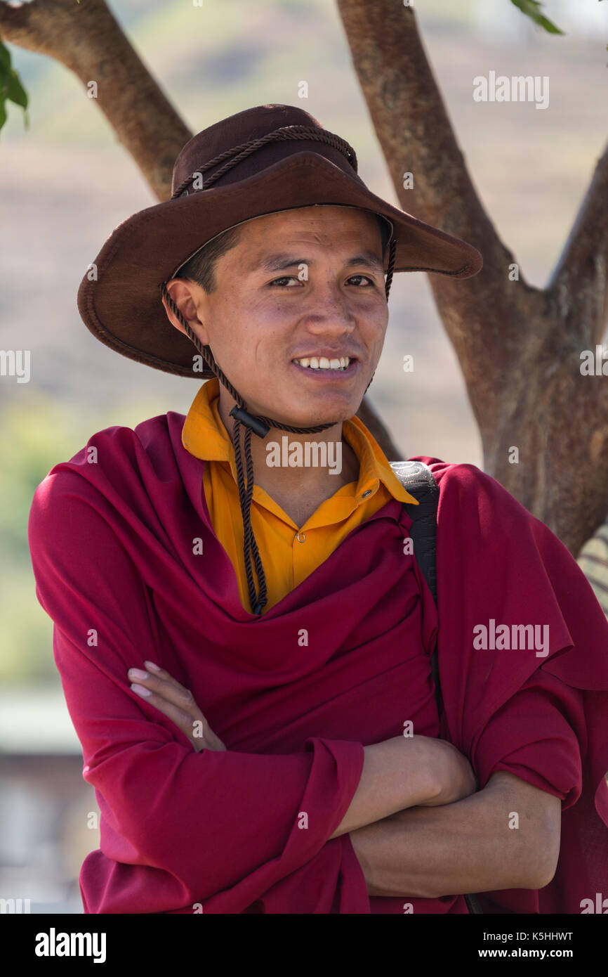 Monk at Punakha Dzong during the annual Tsechu (religious festival) Western Bhutan. Stock Photo