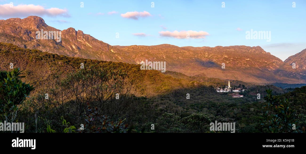 Panoramic image of Caraca Sanctuary neo-gothic church in the middle of the natural reserve and Serra do Caraca in the background, Minas Gerais, Brazil Stock Photo