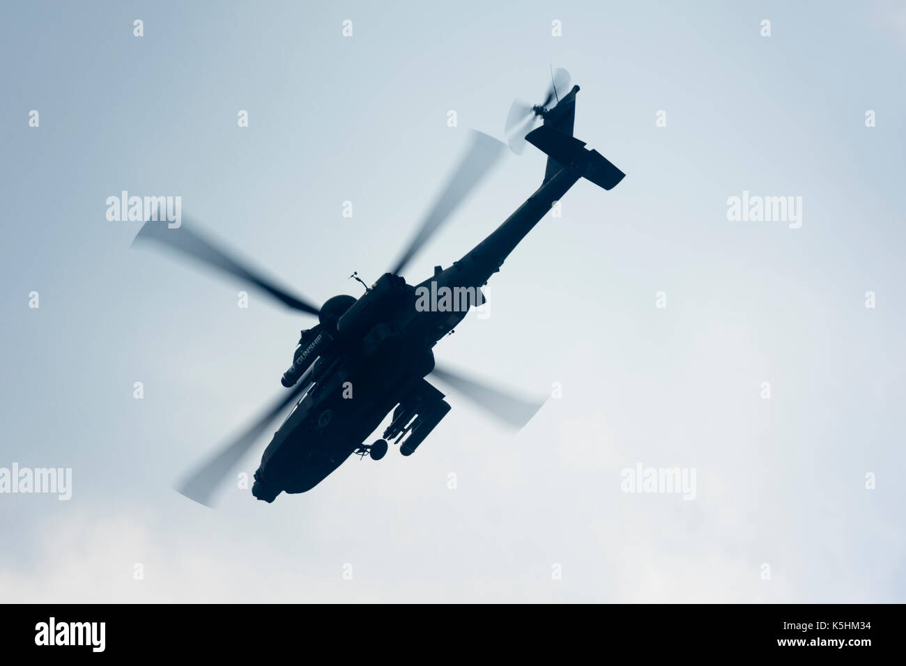 Boeing AH-64 Apache helicopter giving a display. Stock Photo