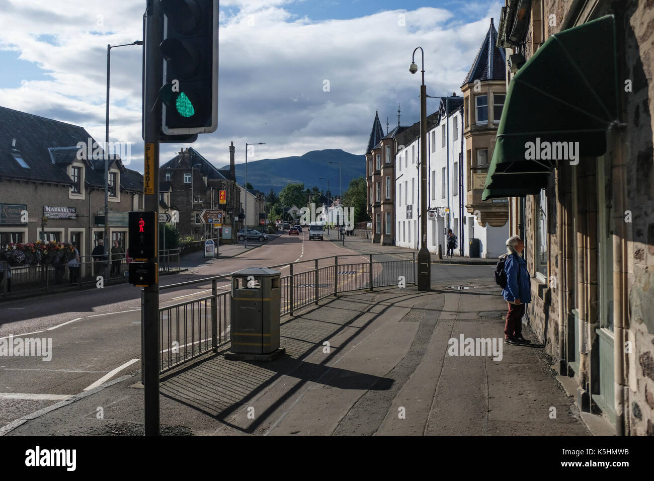 Window shopping in Callander, Perthshire, at Loch Lomond and the Trossachs National Park, near Stirling in Scotland Stock Photo