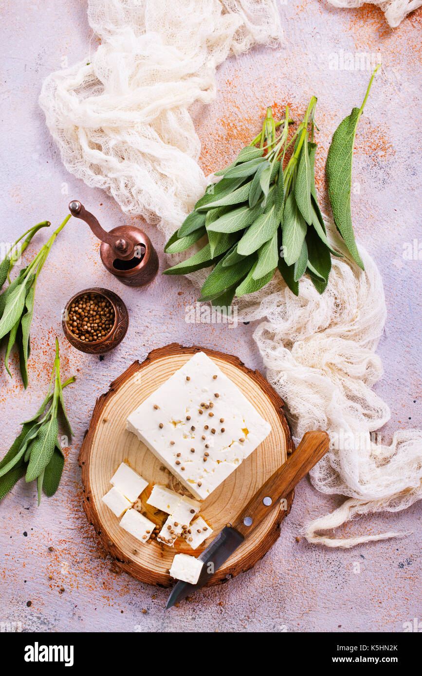 cheese on board and on a table, stock photo Stock Photo