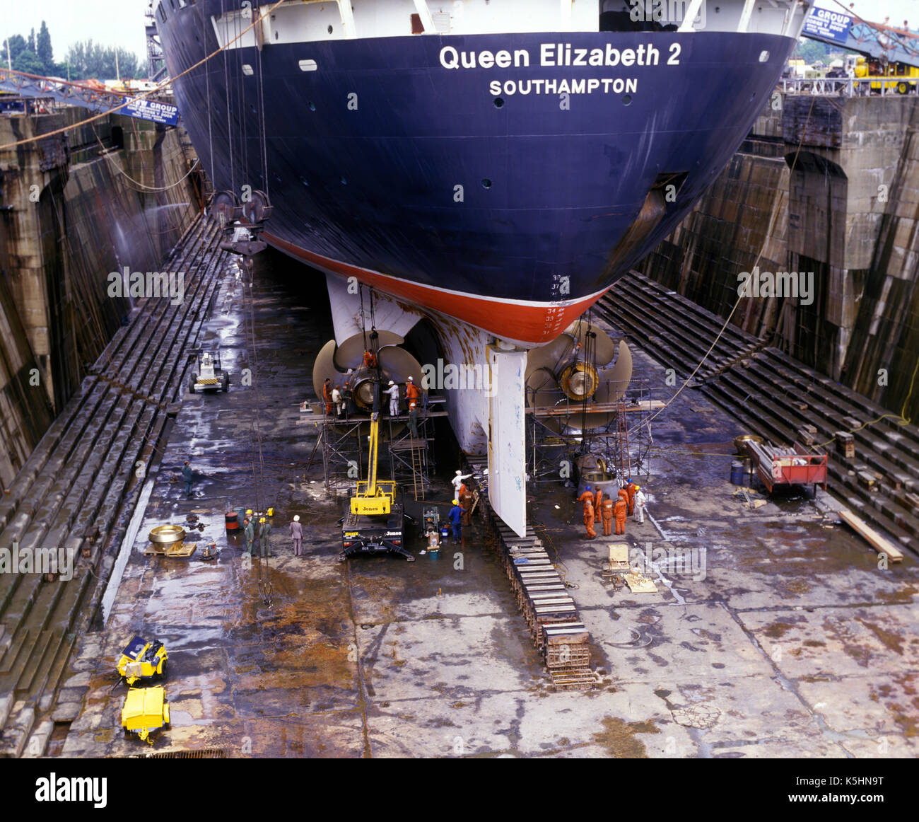 QE2 berthed in the King George V dry dock Southampton, England, where the propellers were replaced following a refit in Germany - 1986-1987 Stock Photo