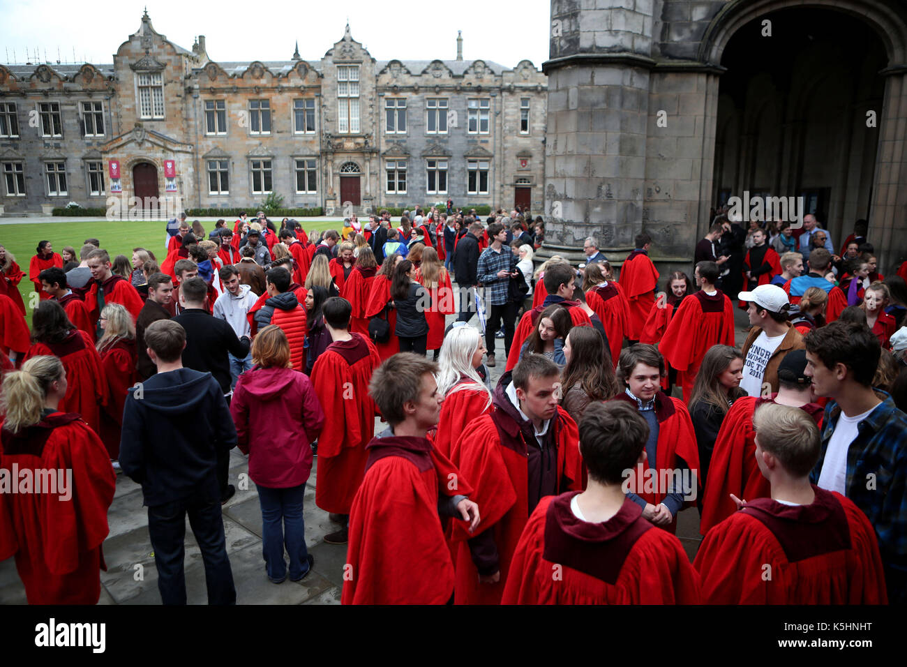 New students at the University of St Andrews congregate in St Salvator's College quad before taking part in the traditional Pier Walk along the harbour walls of St Andrews before the start of the new academic year. The Martinmas Semester starts on Monday September 11, 2017, for all students. Stock Photo